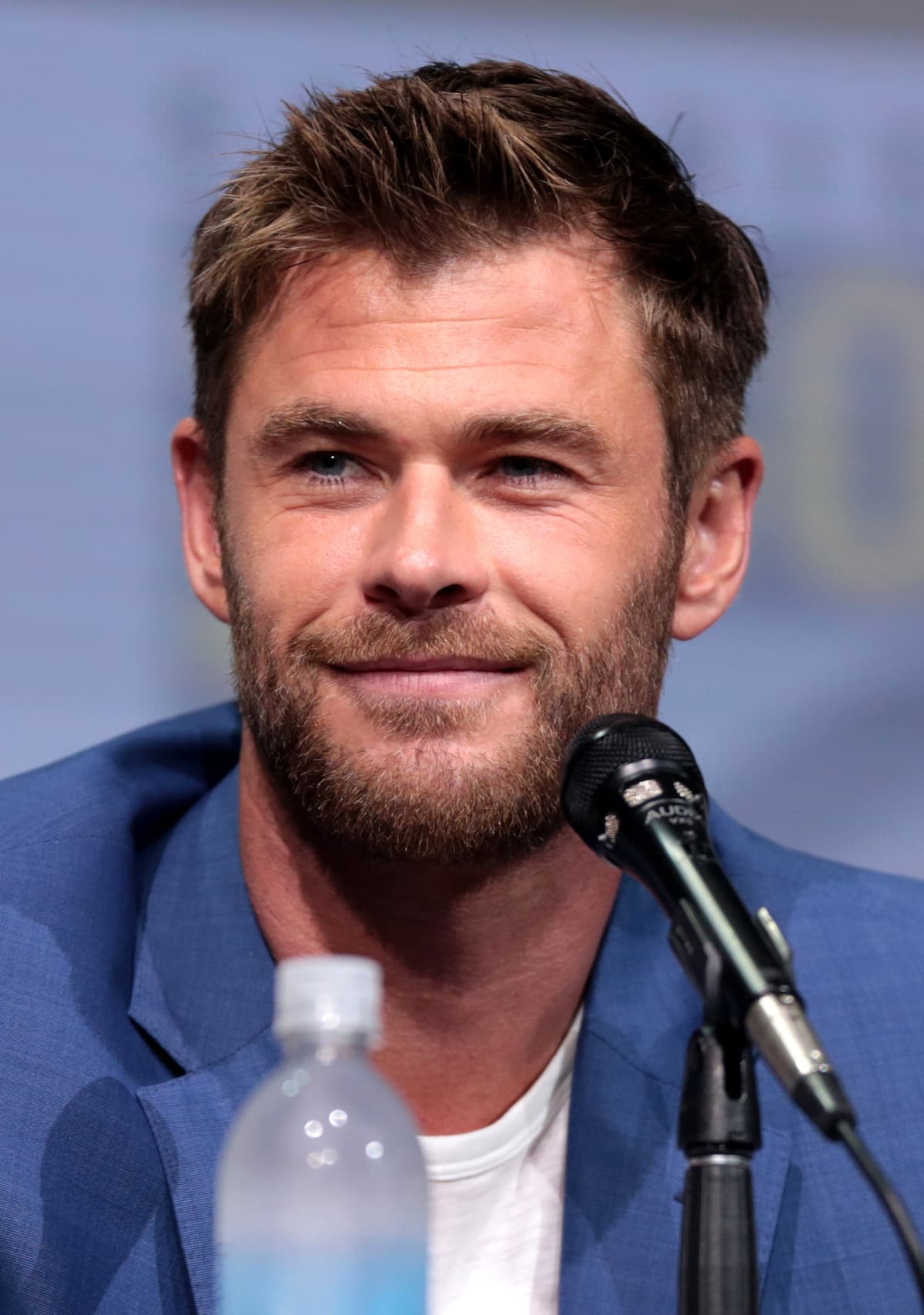 Convention portrait — square jaw and athletic midface under controlled key.