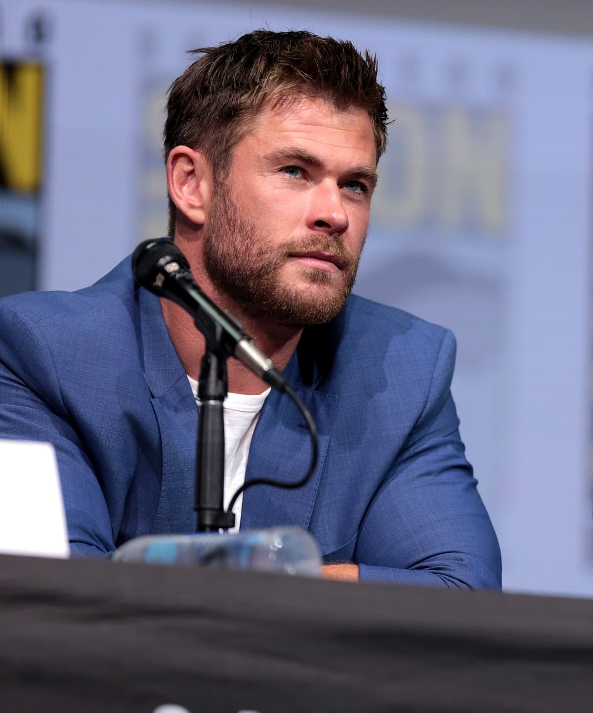 Solo crop from duo press — stress-test midline and soft-smile finish without scene partners.