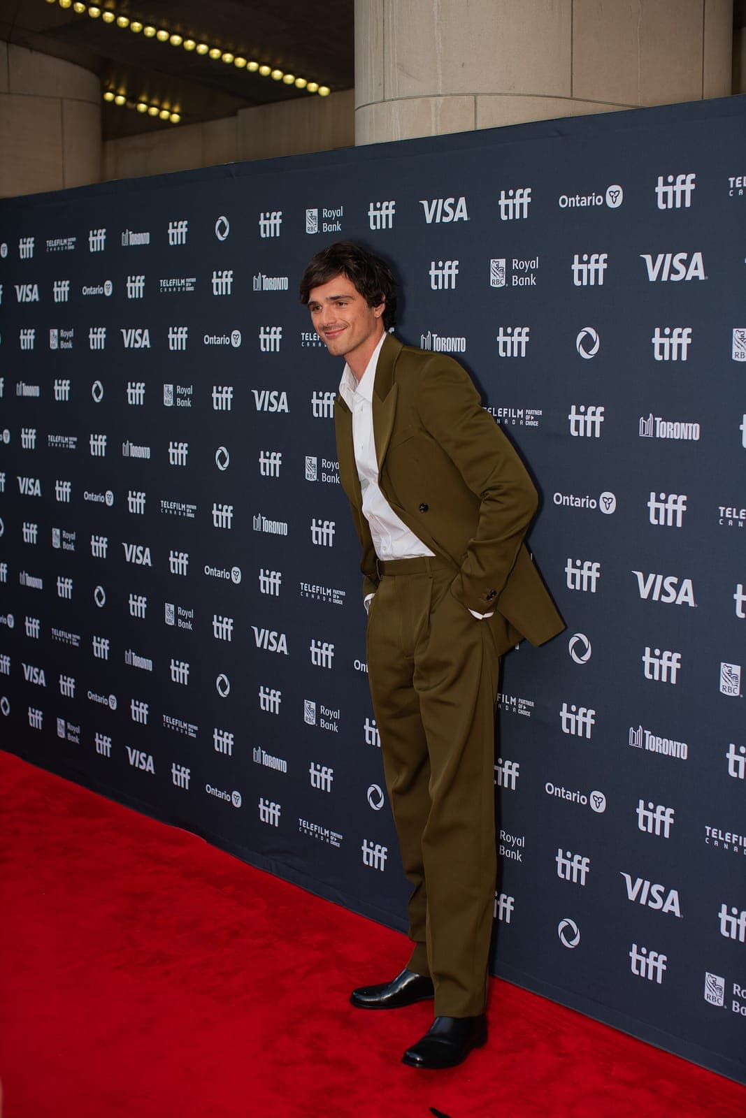 Full-length framing stress-test — tall stack vs facial thirds literacy.