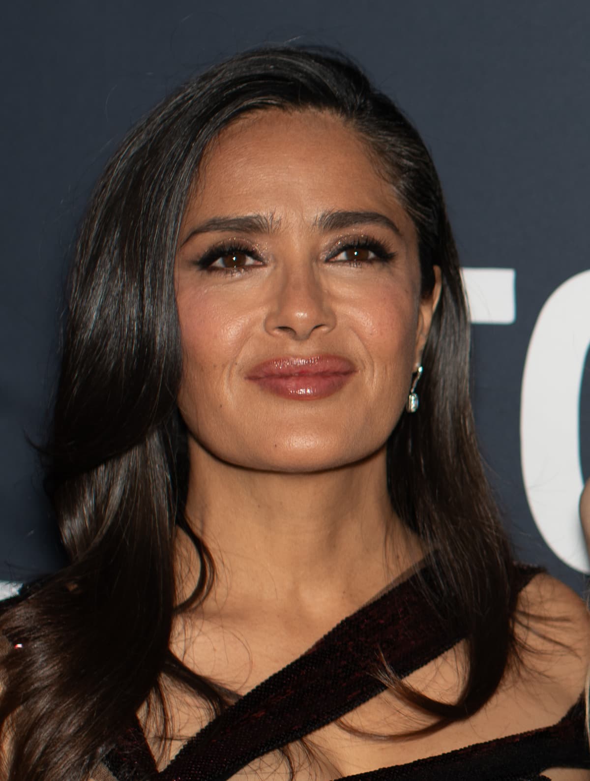 Cropped TIFF frontal — lip soft-smile and midface compactness vs AI headshot.