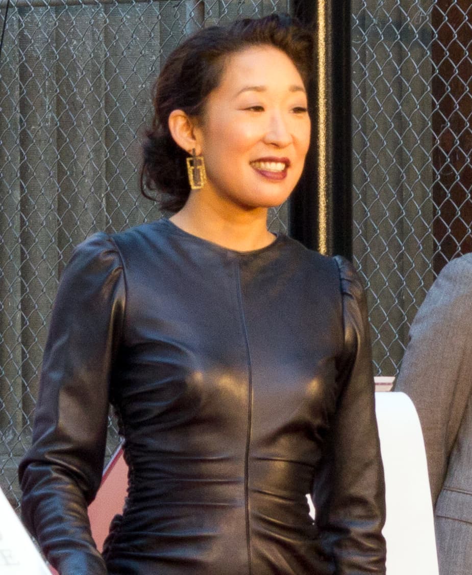 2011 portrait — warm medium undertones and soft oval Korean-Canadian structure.